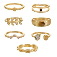 טבעת זהב שחוקה בזמן ובטרו משובצת באבנים יקרות למחצה